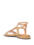 Flache bronzefarbene Sandale