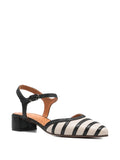 Chie Mihara Haler black and white striped canvas shoe, leather sole with non-slip rubber pad, known for exceptional comfort and fit, handmade in Spain

