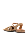 Chie Mihara Tusack camel suede flat sandal with woven gold sole, ankle strap and knotted straps, luxury shoes made in Spain